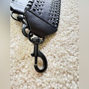 Ribecca Mincoff handbag’s wide strap